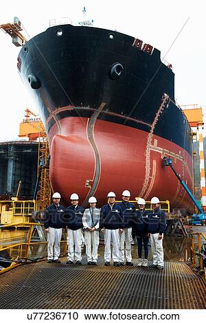 "Portrait of workers at shipyard, GoSeong-gun, South Korea" View Large Photo Image Stock Image - "Portrait of workers at shipyard, GoSeong-gun, South Korea". Fotosearch