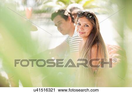 Stock Image - "Portrait of young female tourist, Copacabana, Rio De Janeiro, Brazil". Fotosearch