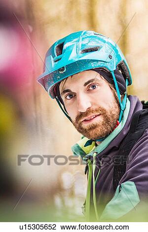 Portrait of young male mountain biker in forest View Large Photo Image Stock Image - Portrait of young male mountain biker in forest. Fotosearch