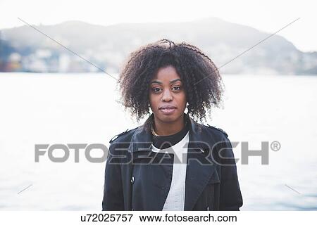 "Portrait of young woman in front of Lake Como, Como, Italy" View Large Photo Image Stock Photo - "Portrait of young woman in front of Lake Como, Como, Italy". Fotosearch
