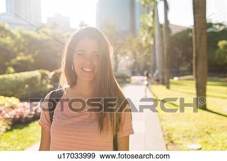 "Portrait of young woman in park, Manila, Philippines" View Large Photo Image Stock Photo - "Portrait of young woman in park, Manila, Philippines". Fotosearch