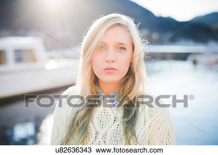 "Portrait of young woman on lakeside, Lake Como, Italy" View Large Photo Image Stock Image - "Portrait of young woman on lakeside, Lake Como, Italy". Fotosearch