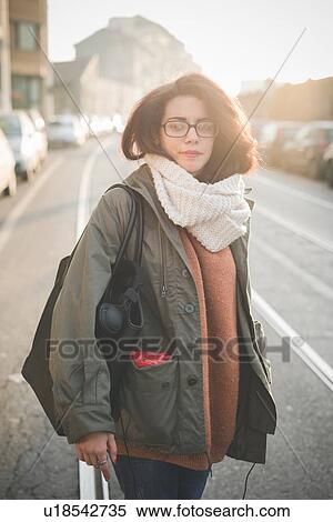 Portrait of young woman on street View Large Photo Image Stock Photography - Portrait of young woman on street. Fotosearch