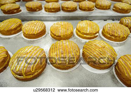 "Prepared cakes in cake factory, close up" View Large Photo Image Stock Image - "Prepared cakes in cake factory, close up". Fotosearch