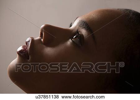 "Profile of young woman, close-up" View Large Photo Image Stock Photo - "Profile of young woman, close-up". Fotosearch