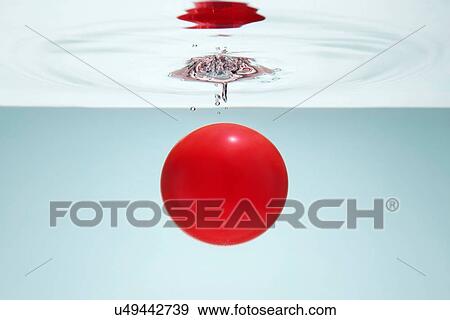 Red circle in water View Large Photo Image Stock Photo - Red circle in water. Fotosearch