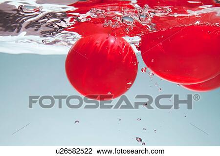 Red circles in water View Large Photo Image Stock Image - Red circles in water. Fotosearch