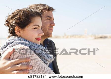 Picture - "Romantic young couple at beach, Tel Aviv, Israel". Fotosearch