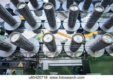"Rows of carbon fibre on loom in carbon fibre factory, close up" View Large Photo Image Stock Photo - "Rows of carbon fibre on loom in carbon fibre factory, close up". Fotosearch