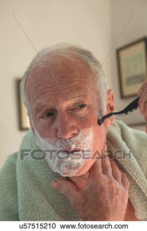 Senior man shaving View Large Photo Image Stock Image - Senior man shaving. Fotosearch