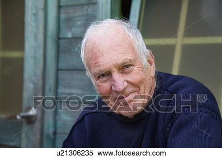 "Senior man sitting, relaxing, outside shed" View Large Photo Image Stock Photography - "Senior man sitting, relaxing, outside shed". Fotosearch