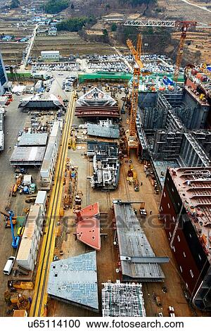 Stock Image - "Shipping port, elevated view, GoSeong-gun, South Korea". Fotosearch
