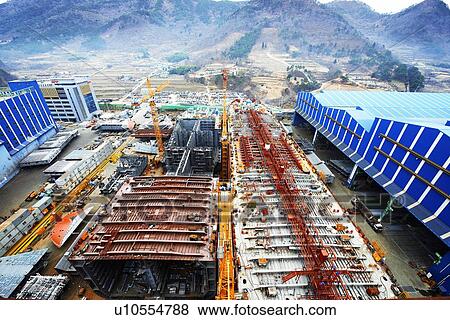 Stock Photo - "Shipping port, elevated view, GoSeong-gun, South Korea". Fotosearch