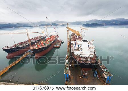 Stock Photography - "Ships at port, elevated view, GoSeong-gun, South Korea". Fotosearch