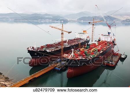 Stock Photo - "Ships at port, GoSeong-gun, South Korea". Fotosearch