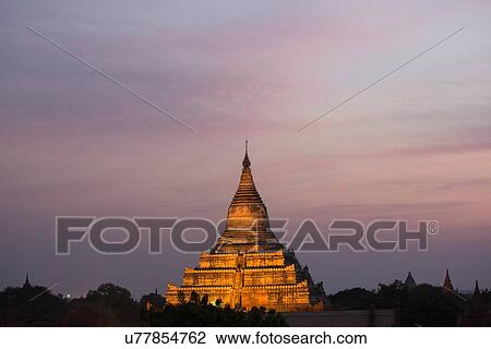 Stock Image - "Shwesandaw Daw pagoda before dawn, Bagan, Myanmar". Fotosearch