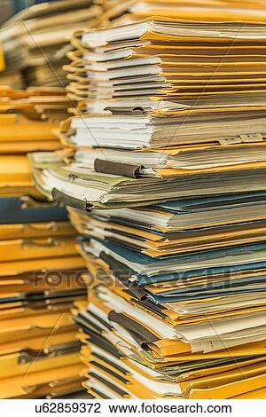 Stock Image - Stacks of paper files. Fotosearch
