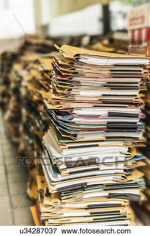 Stacks of paper files View Large Photo Image Stock Photo - Stacks of paper files. Fotosearch