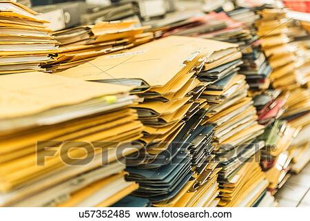 Stock Photography - Stacks of paper files. Fotosearch