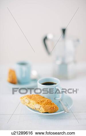 Still life of black coffee and almond cantucci biscuits View Large Photo Image Stock Photograph - Still life of black coffee and almond cantucci biscuits. Fotosearch