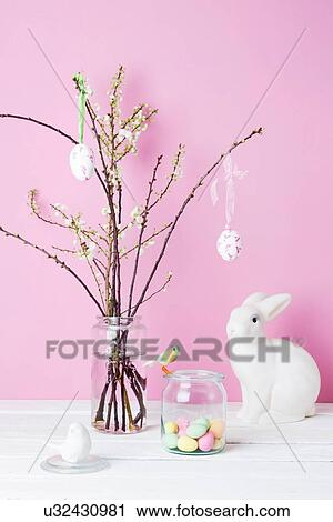 Stock Image - "Still life of blossom twigs, Easter bunny and birds". Fotosearch