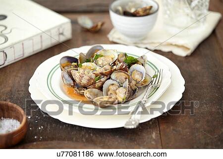 Still life of bowl of whole cooked clams View Large Photo Image Stock Photograph - Still life of bowl of whole cooked clams. Fotosearch