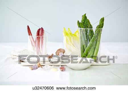 Still life with asparagus and lettuce with mayonaise View Large Photo Image Stock Photograph - Still life with asparagus and lettuce with mayonaise. Fotosearch