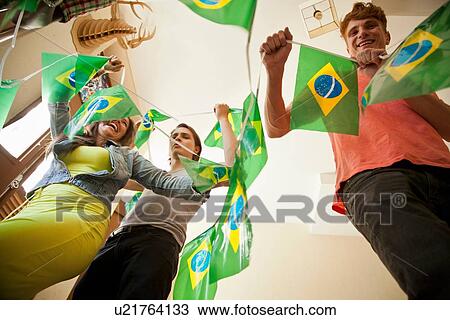 Students celebrating with Brazilian flags View Large Photo Image Stock Image - Students celebrating with Brazilian flags. Fotosearch