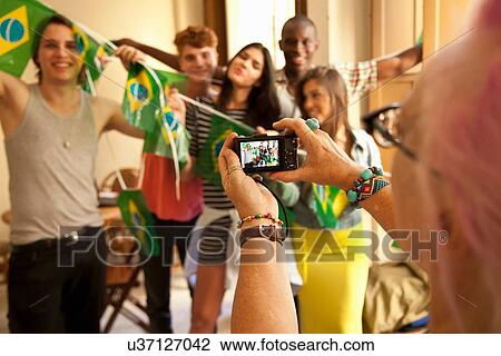 Students celebrating with Brazilian flags View Large Photo Image Stock Image - Students celebrating with Brazilian flags. Fotosearch