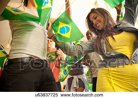 Students celebrating with Brazilian flags View Large Photo Image Stock Photography - Students celebrating with Brazilian flags. Fotosearch