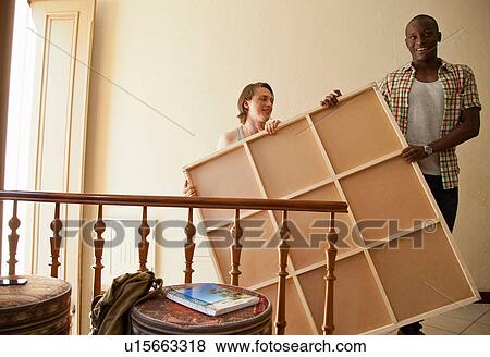 Stock Photo - Students moving into accommodation. Fotosearch