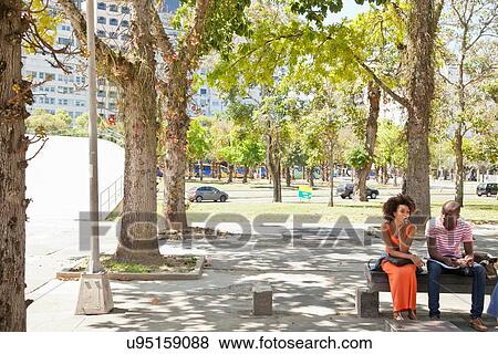 "Students sitting under tree, Rio de Janeiro, Brazil" View Large Photo Image Stock Photo - "Students sitting under tree, Rio de Janeiro, Brazil". Fotosearch