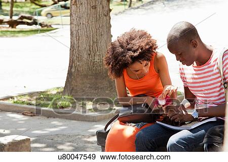 Students sitting under tree View Large Photo Image Stock Photo - Students sitting under tree. Fotosearch