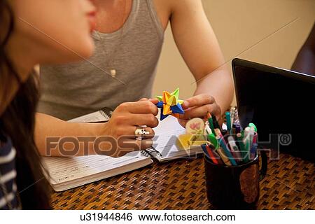 Students using laptop and relaxing View Large Photo Image Stock Photograph - Students using laptop and relaxing. Fotosearch