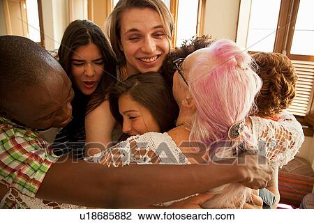 Stock Image - Students welcoming and greeting lecturer. Fotosearch
