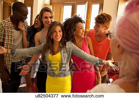 Stock Photo - Students welcoming and greeting lecturer. Fotosearch