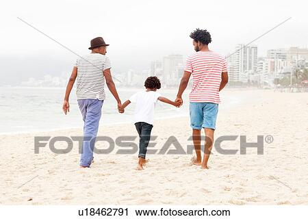 "Three generation family enjoying beach, Rio de Janeiro, Brazil" View Large Photo Image Stock Image - "Three generation family enjoying beach, Rio de Janeiro, Brazil". Fotosearch