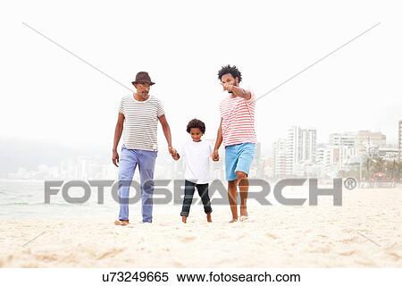 Stock Photography - "Three generation family enjoying beach, Rio de Janeiro, Brazil". Fotosearch