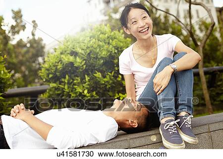 "Tourist couple on wall, The Bund, Shanghai, China" View Large Photo Image Stock Image - "Tourist couple on wall, The Bund, Shanghai, China". Fotosearch