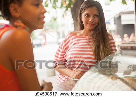 "Two female tourists waiting at juice bar, Copacabana town, Rio De Janeiro, Brazil" View Large Photo Image Stock Photo - "Two female tourists waiting at juice bar, Copacabana town, Rio De Janeiro, Brazil". Fotosearch