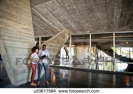 Picture - Two students at college. Fotosearch