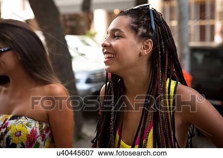 "Two young women chatting on street, Copacabana town, Rio De Janeiro, Brazil" View Large Photo Image Stock Photo - "Two young women chatting on street, Copacabana town, Rio De Janeiro, Brazil". Fotosearch