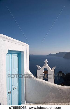 "View of blue church entrance and bell tower, Oia, Santorini, Cyclades, Greece" View Large Photo Image Stock Image - "View of blue church entrance and bell tower, Oia, Santorini, Cyclades, Greece". Fotosearch