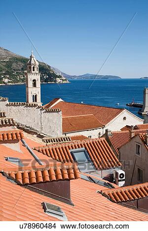 "View of church tower and rooftops, Dubrovnik, Croatia" View Large Photo Image Picture - "View of church tower and rooftops, Dubrovnik, Croatia". Fotosearch