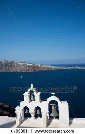 "View of sea and white washed church bell tower, Oia, Santorini, Cyclades, Greece" View Large Photo Image Stock Image - "View of sea and white washed church bell tower, Oia, Santorini, Cyclades, Greece". Fotosearch