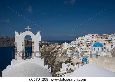 "View of white washed church bell tower and town, Oia, Santorini, Cyclades, Greece" View Large Photo Image Stock Photo - "View of white washed church bell tower and town, Oia, Santorini, Cyclades, Greece". Fotosearch