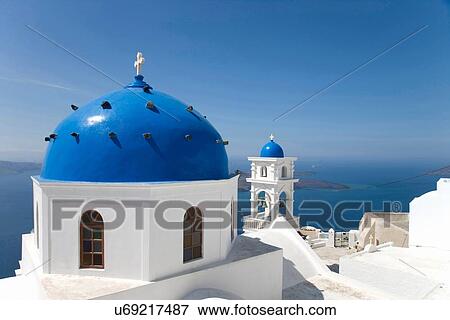 "View of white washed church with blue domes, Oia, Santorini, Cyclades, Greece" View Large Photo Image Stock Photo - "View of white washed church with blue domes, Oia, Santorini, Cyclades, Greece". Fotosearch