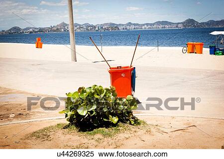 Stock Photography - "Wheelie bin on beach, Rio de Janeiro, Brazil". Fotosearch