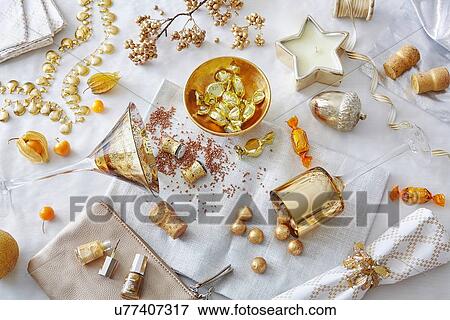 White and gold colored still life with confectionery and variety of objects View Large Photo Image Stock Photo - White and gold colored still life with confectionery and variety of objects. Fotosearch