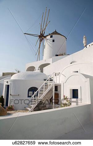 "Whitewashed houses and windmill, Oia, Santorini, Cyclades, Greece" View Large Photo Image Stock Photo - "Whitewashed houses and windmill, Oia, Santorini, Cyclades, Greece". Fotosearch